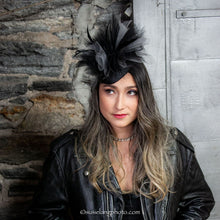 Load image into Gallery viewer, Black sinamay tear drop percher with black and grey tulle, black sculpted feathers, and vintage leather buckle.
