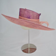 Load image into Gallery viewer, Coral and amethyst sinamay with sinamay ribbons and handmade flowers. Side view.