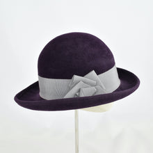 Load image into Gallery viewer, Gorgeous aubergine velour felt with silver grosgrain ribbon trim. Side view.
