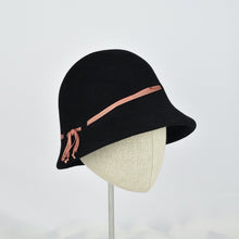 Load image into Gallery viewer, Black fur felt with narrow coral colored ribbon in a classic cloche style. 3/4 side view.