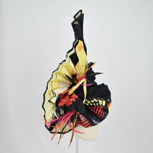 Load image into Gallery viewer, Pleated silk on yellow sinamay with feather and sinamay trim.  3/4 Side view.
