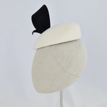 Load image into Gallery viewer, White velour felt percher with a black velour felt swirl trim. Side view.