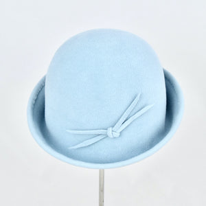 Baby blue velour fur felt with an asymmetrical flip. Side view.