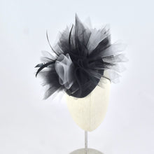 Load image into Gallery viewer, Black sinamay tear drop percher with black and grey tulle, black sculpted feathers, and vintage leather buckle. Front view.