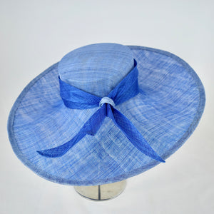 Two-tone wide brim blue sinamay hat. Side view.