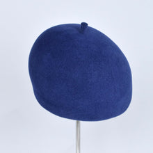 Load image into Gallery viewer, A french blue velour beret hat displayed on a mannequin head.
