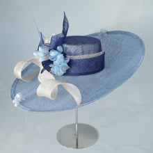 Load image into Gallery viewer, Beautiful wide sweeping brim in two tones of sinamay, with sinamay swirls and hand made flowers. 
