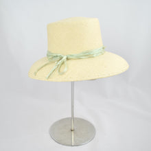 Load image into Gallery viewer, Panama straw with pale green distressed silk ribbon. 3/4 front view.
