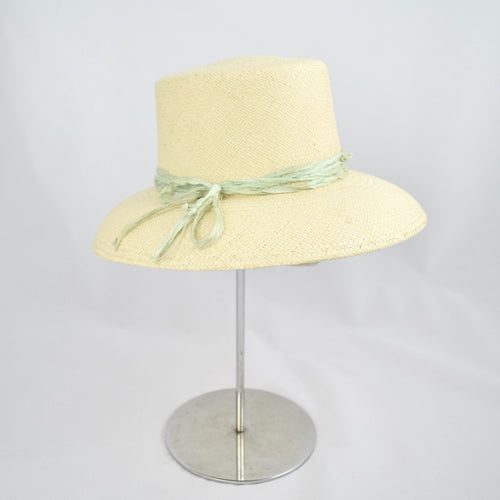 Panama straw with pale green distressed silk ribbon. 3/4 front view.