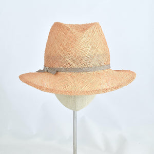 Fedora in peach colored knotted sisal.  Front view.