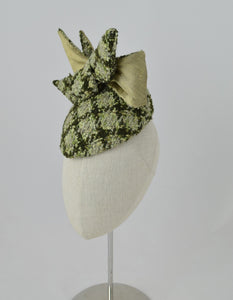 Green wool plaid teardrop cocktail hat with the perfect silk and wool bow on the top.  3/4 front view.