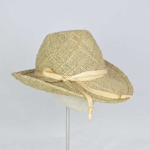 Seagrass straw in a modified cowboy look with removable hand dyed ribbon. 3/4 front view.