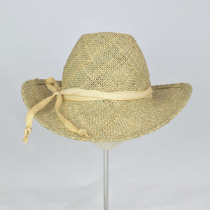 Seagrass straw in a modified cowboy look with removable hand dyed ribbon. Front view.