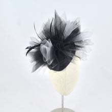 Load image into Gallery viewer, Black sinamay tear drop percher with black and grey tulle, black sculpted feathers, and vintage leather buckle.  Front view.
